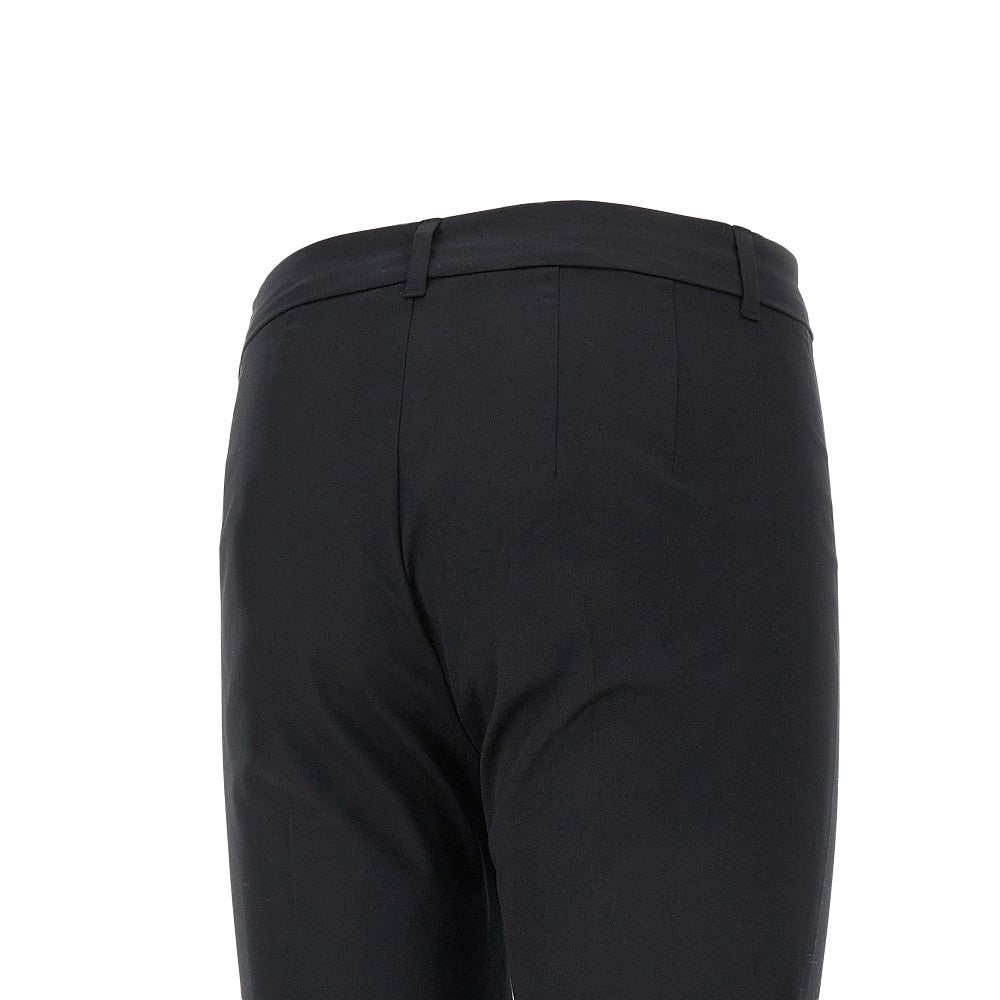 Pantalone svasato in cotone stretch