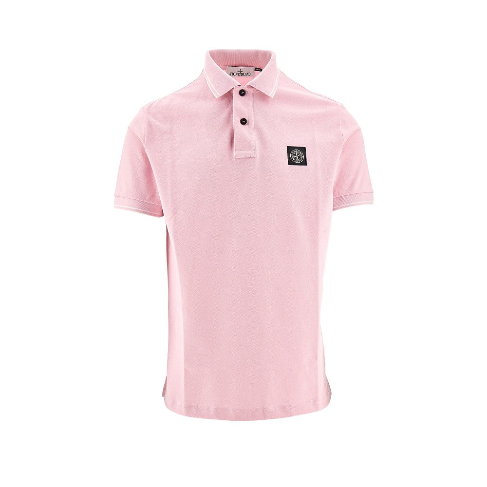 Polo in piquet stretch con patch logo