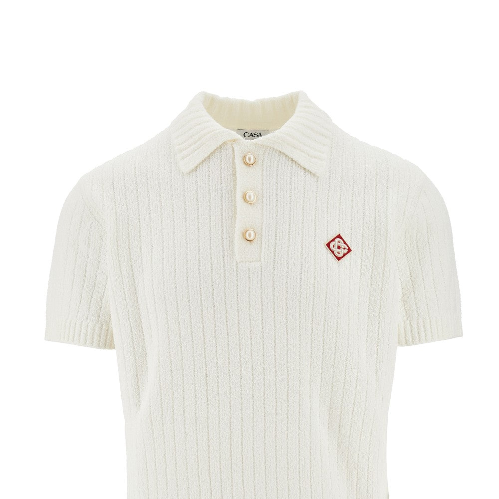 Polo in maglia bouclé