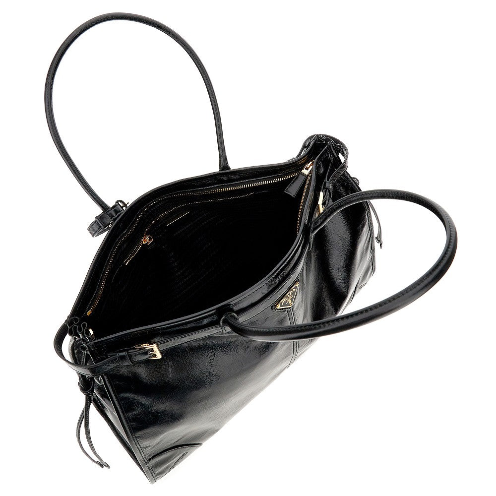 Shiny leather large handbag