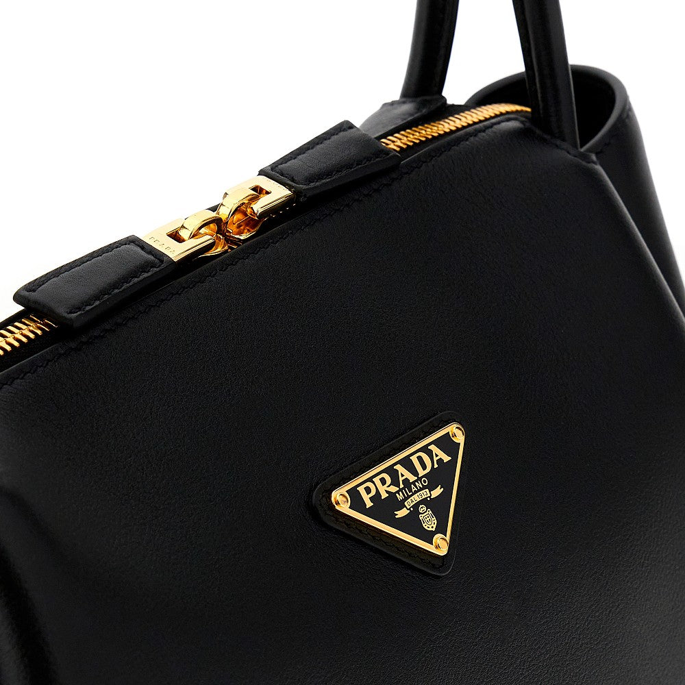 Leather bag with triangle logo